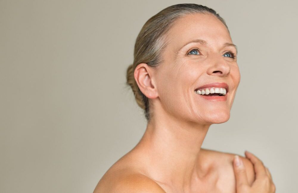 old woman with blue eyes smiles