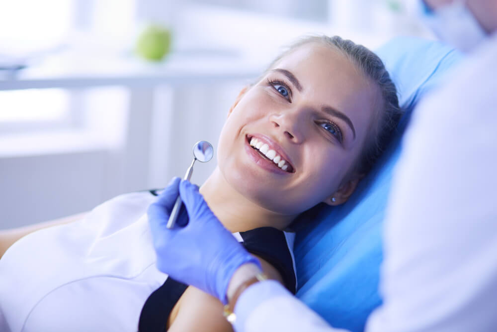 happy woman on the dentist