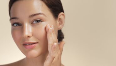 woman applying skincare products