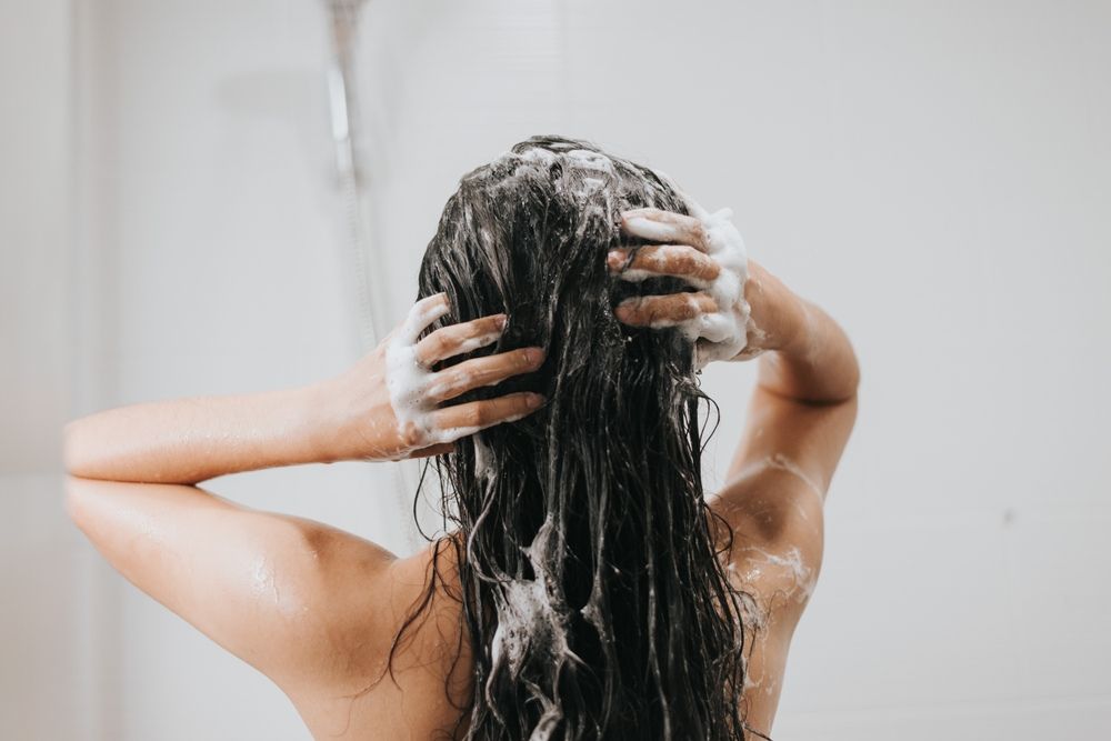 woman shampooing