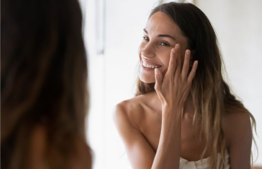 Woman applying Serum