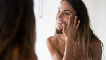 Woman applying Serum