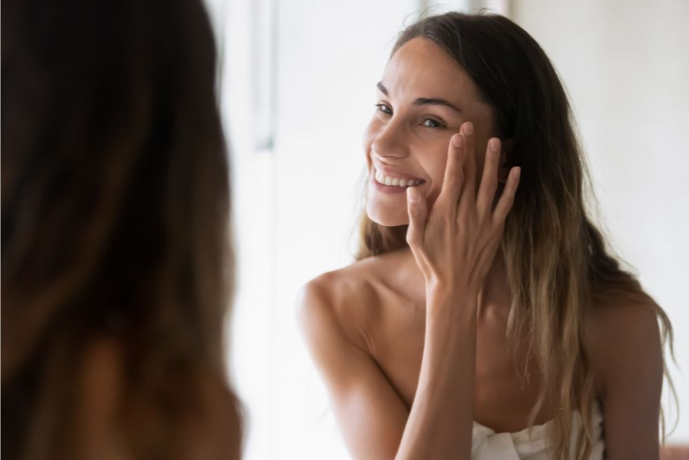 Woman applying Serum