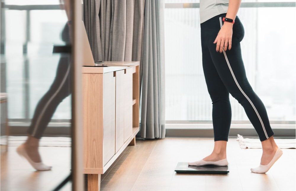 WOMAN WEIGHING