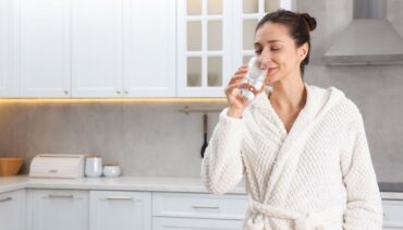 WOMAN DRINKING WATER