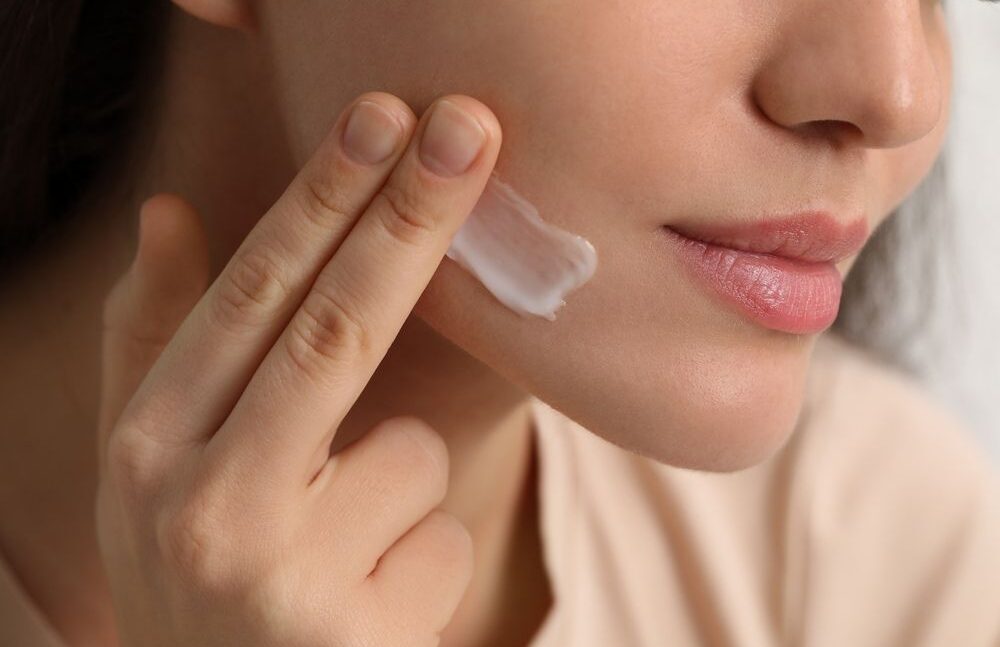 Woman Applying Cream