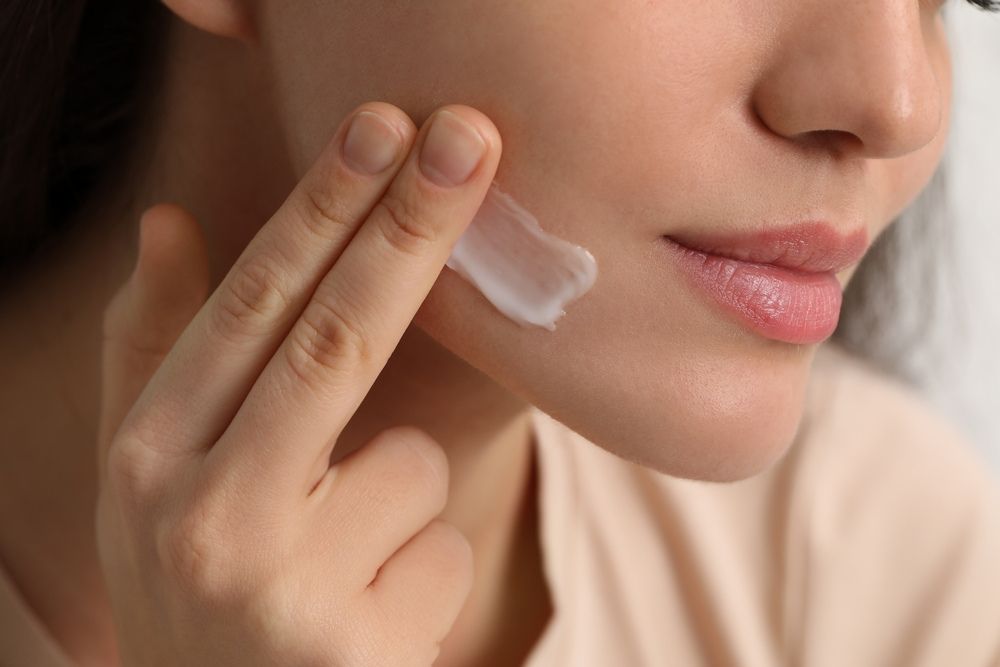 Woman Applying Cream
