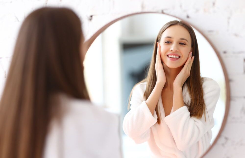 Woman applies cream